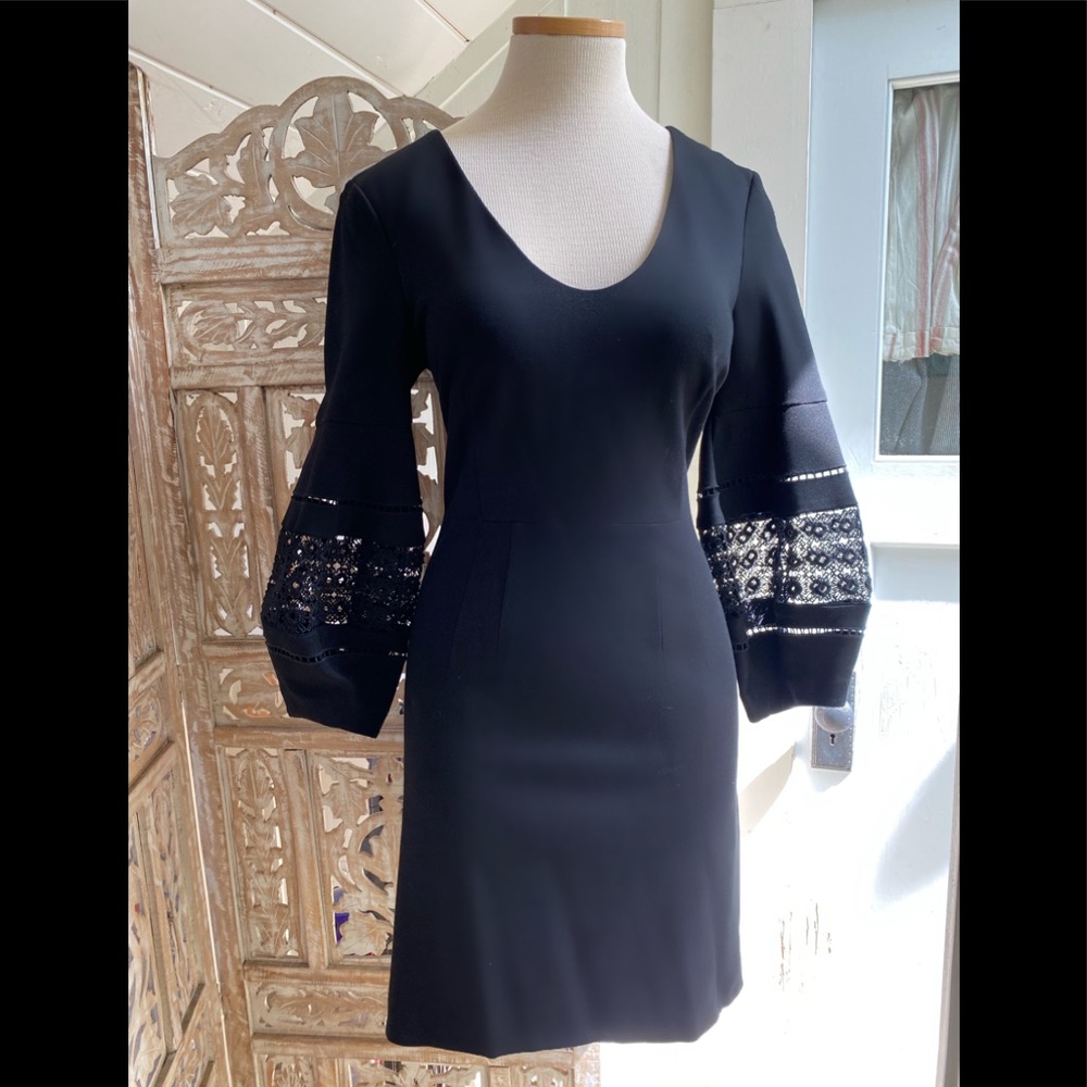 Trina Turk black cutout l/s sleeve dress.